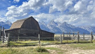 The iconic John Moulton barn with the Teton range in the background